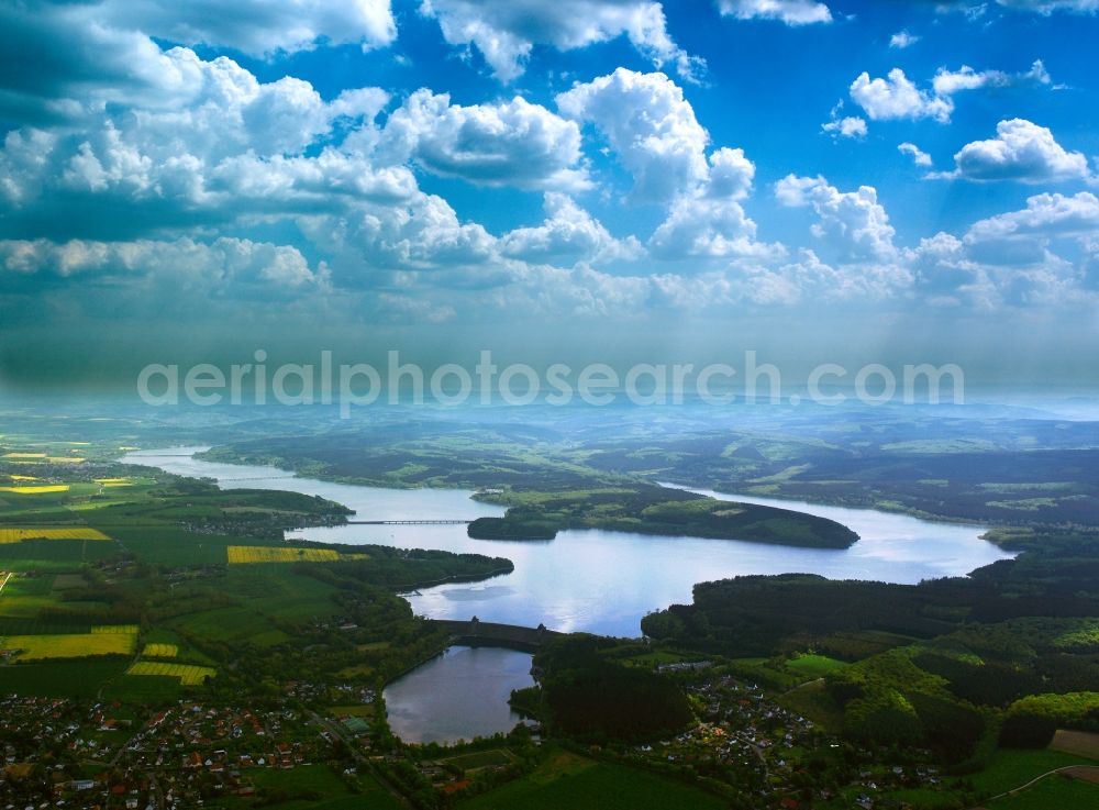 Aerial photograph Möhnesee - The lake Möhnesee in the county of Möhnesee in the state of North Rhine-Westphalia. The lake is a barrier lake on the river Möhne. It is located on the Nature Park Arnsberger Forest and it is bird protection area as well as nature preserve area in parts. Its dam is officially listed as a protected building