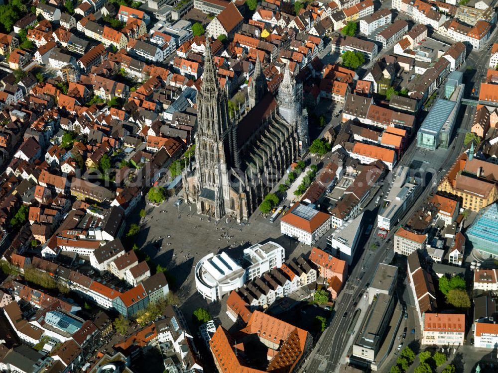 Ulm from above - Views of the Minster of Ulm. The Minster is the main church was built in the Gothic style of the former free imperial city of Ulm. The 161.53-meter-high tower is the tallest church tower in the world