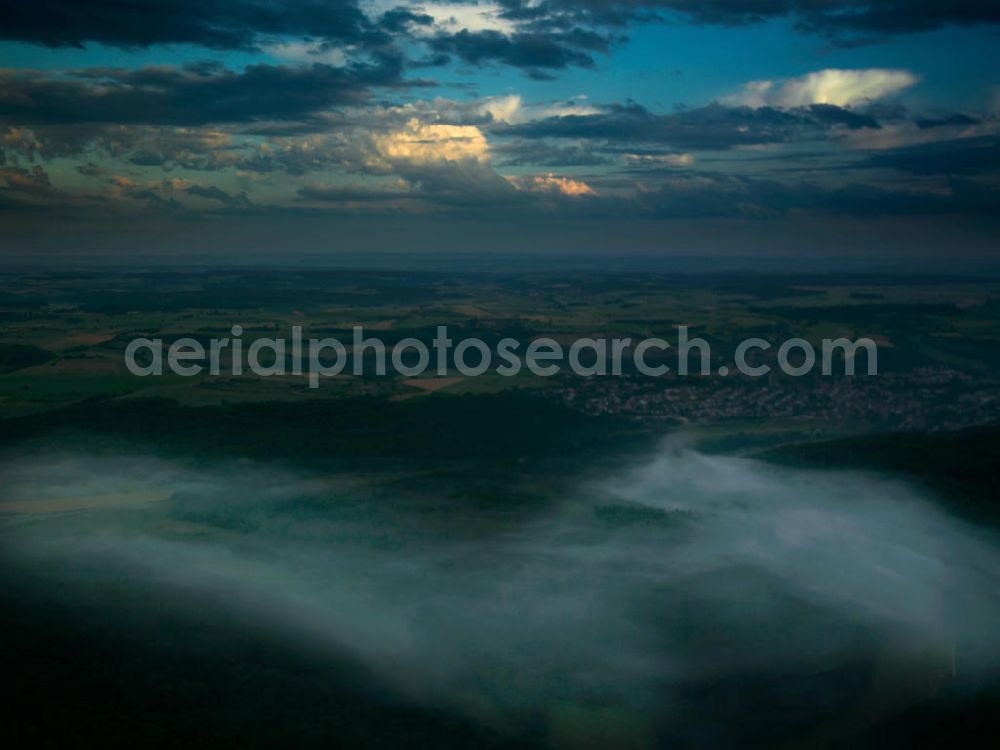 Odenwaldkreis from above - View above the oden forest with fog in the valleys. The forest ranges over three federal states