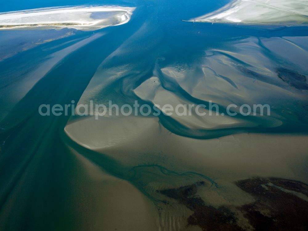 Krummhörn from above - The Wadden Sea National Park was established in 1986 and encompasses the East Frisian islands, tidal flats and Seemarschen. Since June 2009, the National Park of Lower Saxony Wadden Sea National Park, together with the Schleswig-Holstein Wadden Sea and the Dutch Wadden Sea is a UNESCO World Heritage Site