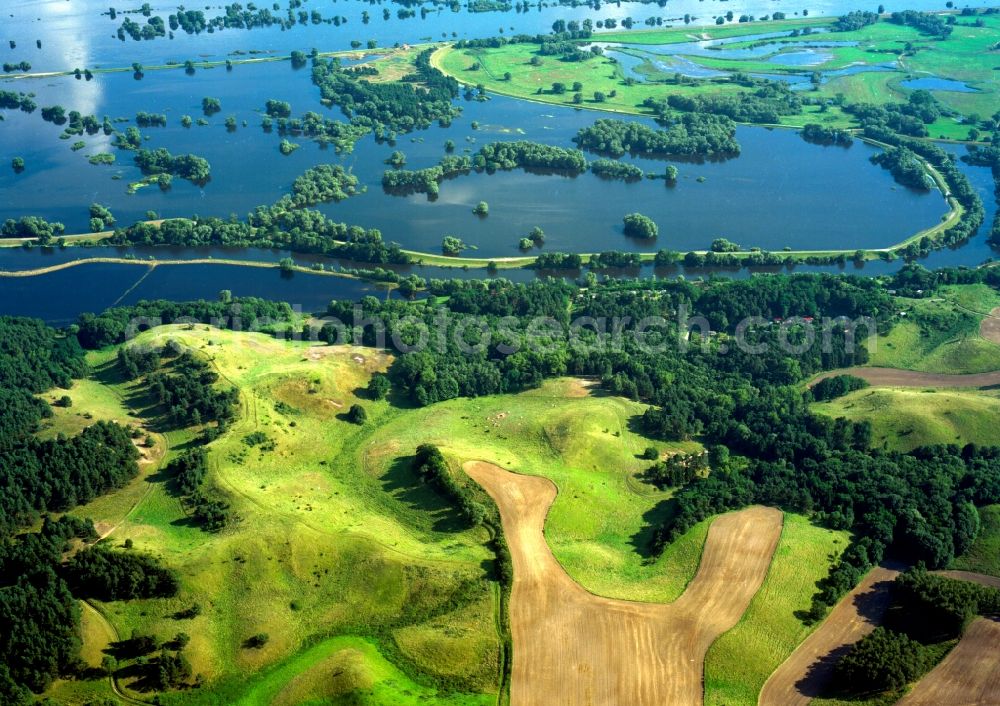 Schwedt from above - Lower Oder Valley National Park is a National Park was established in 1995 in Germany. It is located on the lower reaches of the Oder in the north-east of Brandenburg, district Uckermark. The National Park is surrounded on the German side of the large conservation area the Lower Oder Valley National Park region. The national park is adjacent to the Polish countryside and the Lower Oder Valley National Park Zehdener Landscape Park and its protection zone is a geographical unit. The large river-floodplain landscape is a habitat for many rare or endangered plants and animals, including beaver