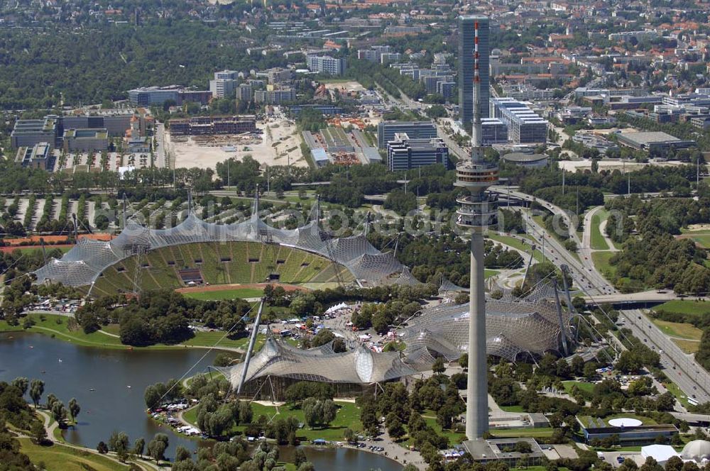 München from the bird's eye view: Der Olympiapark befindet sich auf dem Oberwiesenfeld. Bis heute ist er Austragungsort für sportliche Veranstaltungen sowie Veranstaltungsort für kulturelle, gesellschaftliche oder religiöse / weltanschauliche Veranstaltungen beziehungsweise Gottesdienste. Munich 2007/07/15 The Olympiapark, in the area of Munich known as the Oberwiesenfeld, continues to serve as a venue for cultural, social, and religious events such as events of worship.