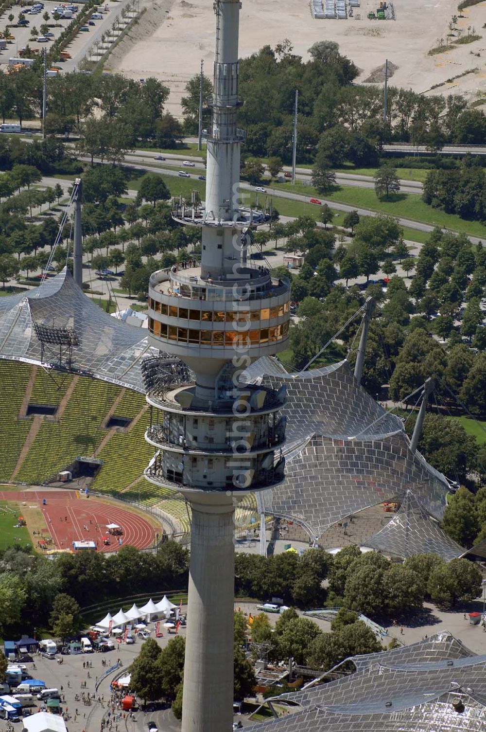 Aerial photograph München - Der Olympiaturm ist ein Fernsehturm in München und eines der Wahrzeichen des Olympiaparks. Mit Antenne ist er 291,28 m hoch. Munich 2007/07/15 The Olympiatower is a television tower in Münich and one of the Olympiapark's landmark. Including the antenna, it is 291,28 meters high.