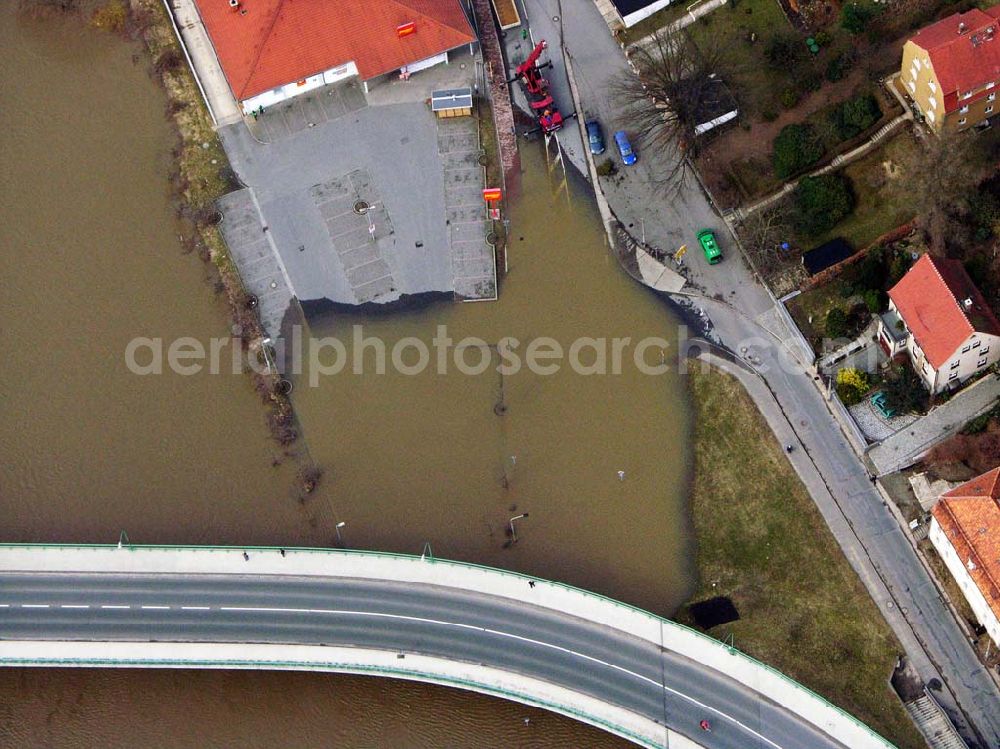 Aerial photograph Bad Schandau - 31.03.2006 Bad Schandau; Hochwasser in Bad Schandau durch die Elbe. Der Pennymarkt in Bad Schandau. 01814 Bad Schandau, Hohensteiner Str. 35