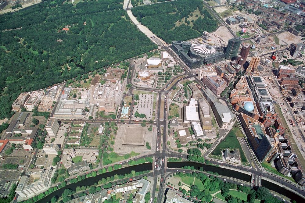 Aerial image Berlin - The Potsdamer Platz with its modern architecture, the Sony Center, the shopping center at Potsdamer Platz Arcades and the Musical Theatre, the Cultural Forum with the State Library, the Philharmonic, the museums and the New National Gallery and the embassy district with the Embassy Austria, India and South Africa at the Tiergarten is an important center of culture, trade and politics in the heart of Berlin-Mitte