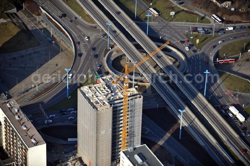 Halle / Saale from the bird's eye view: View of the demolition of a residential twin tower of the Riebeckplatz 10 in Halle. The 22-storey residential building had to give way for a redesign of the Riebeckplatz. First, the building has been completely cleared and seeded. The Reinwald Entsorgungs company is responsible for decommissioning