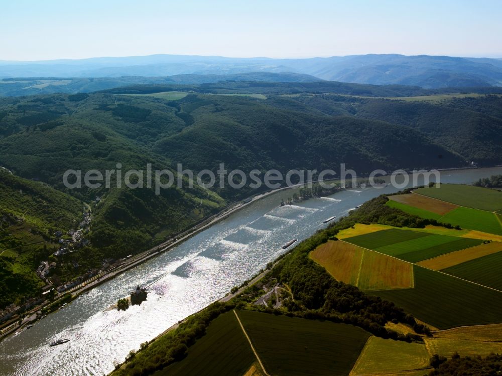 Kaub from above - The Rhine at Kaub in the state of Rhineland-Palatinate. The town of Kaub is located on the East riverbank of the Rhine in the Upper Middle Rhine valley. Castle Pfalzgrafenstein is located on an island in the river. It was originally built as a toll station and is a protected cultural heritage. View from the North to the South