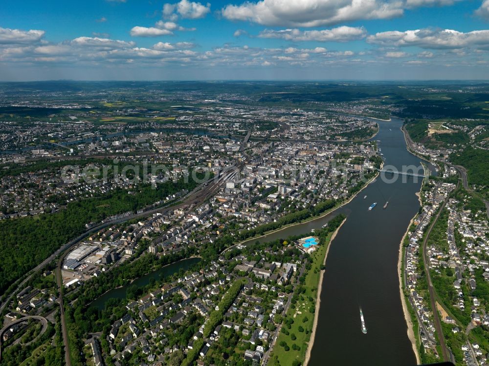 Koblenz from the bird's eye view: The river Rhine in Koblenz in the state of Rhineland-Palatinate. The metropolitan area of Koblenz is one of the oldest cities in Germany. Parts of Koblenz belong to the UNESCO world heritage. The river separates the city. Bridges, ships and small islands mark the run of the river in the area