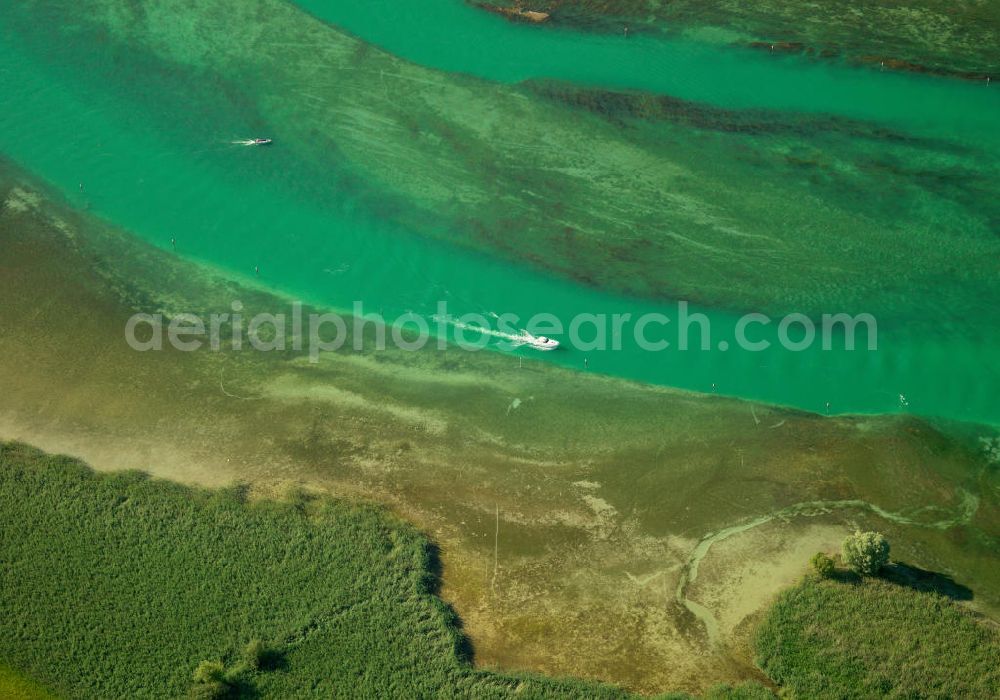 Aerial photograph Stein am Rhein - View of the Rhine river at the effluent of the Boden lake, which describes the border between Germany and Switzerland. The flow of the river at this point is still very slow, so that sandbars in the river bed could form, although they have to be trenched for shipping traffic