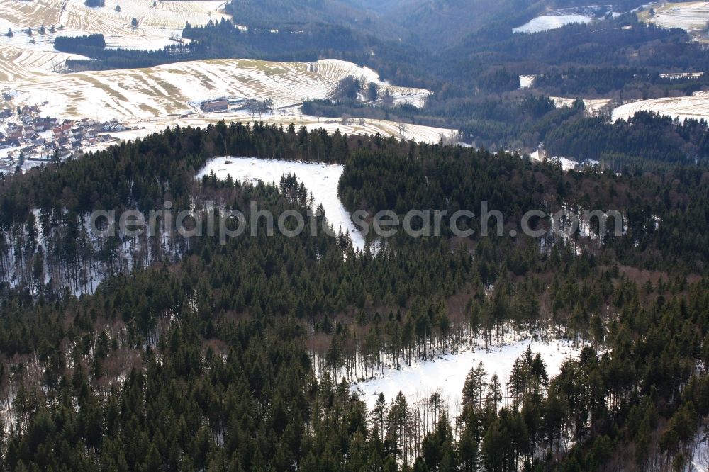 Aerial photograph Schopfheim - On the Rohrenkopf, the local mountain of Gersbach, a district of Schopfheim in Baden-Wuerttemberg, five wind turbines are planned to be built. The building areas for the wind turbines have already been cleared in the forest landscape