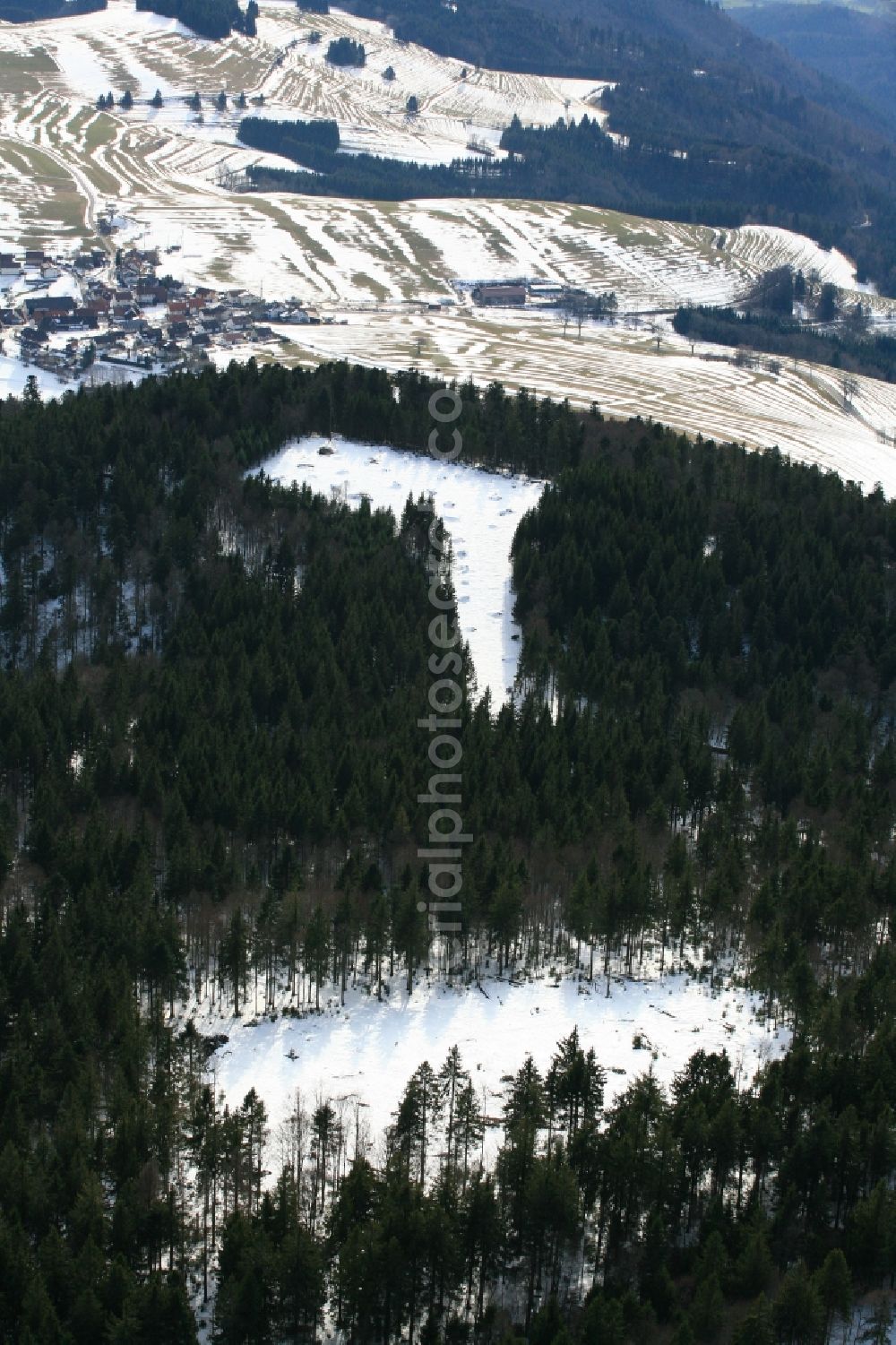 Schopfheim from above - On the Rohrenkopf, the local mountain of Gersbach, a district of Schopfheim in Baden-Wuerttemberg, five wind turbines are planned to be built. The building areas for the wind turbines have already been cleared in the forest landscape