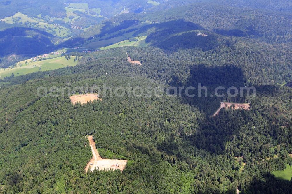 Schopfheim from above - On the Rohrenkopf, the local mountain of Gersbach, a district of Schopfheim in Baden-Wuerttemberg, five wind turbines are built. The building areas for the wind turbines have already been cleared in the forest landscape