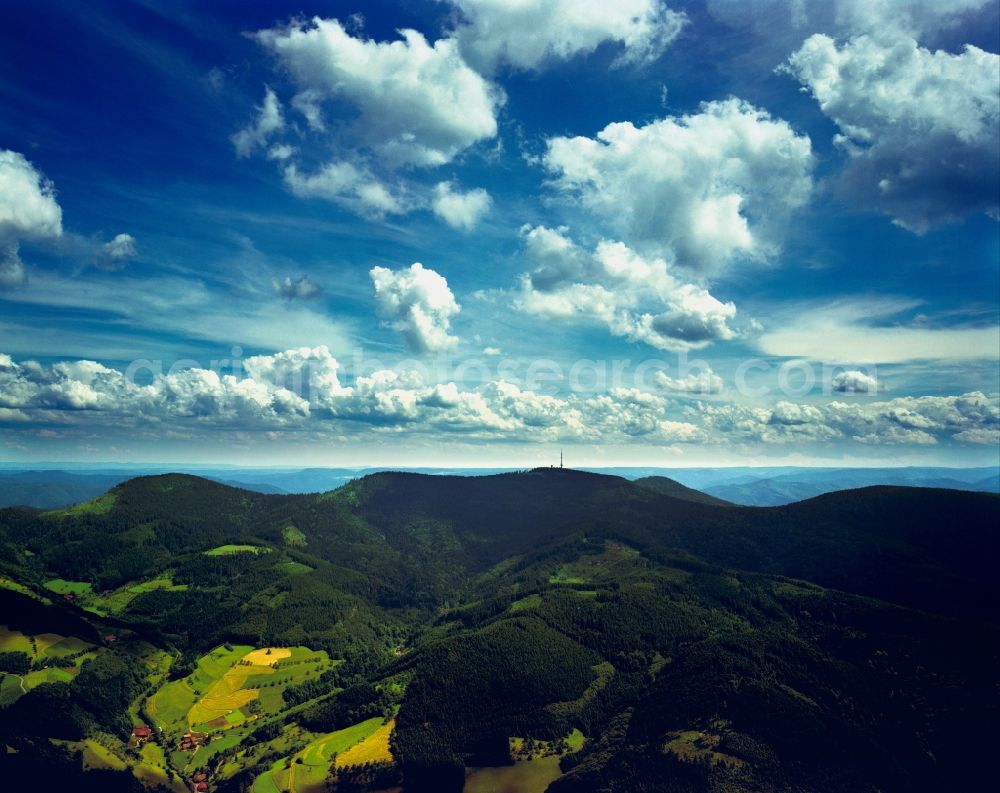 Bühl from above - The Black Forest in the state of Baden-Württemberg. Visible in the background is the broadcasting tower on the mountain Hornisgrinde, the highest mountain of the Northern Black Forest. The Black Forest is Germany's highest and largest connected low mountain range, located in the Sout West of the state of Baden-Württemberg. Today, it is mostly significant for its tourims sites and regions