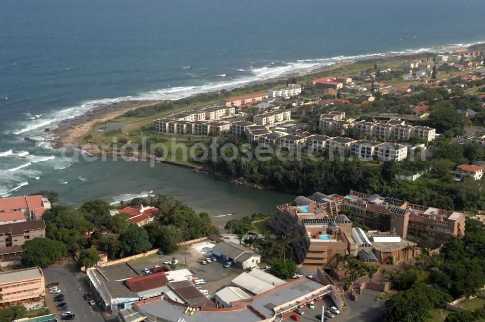 Aerial image UVONGO - Townscape of St. Micheal's on Sea, a district of Uvongo, South Africa. Uvongo is a seaside resort south of Port Shepstone with a lot of hotels and holiday homes. It is the largest residental area on the South Coast of Africa. In the right-hand corner lies the Uvago Falls Penthouse