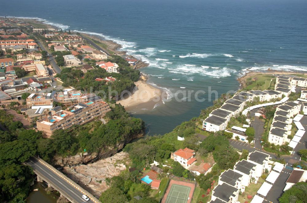 Aerial image UVONGO - Townscape of St. Micheal's on Sea, a district of Uvongo, South Africa. Uvongo is a seaside resort south of Port Shepstone with a lot of hotels and holiday homes. It is the largest residental area on the South Coast of Africa. On the left side lies the Uvago Falls Penthouse