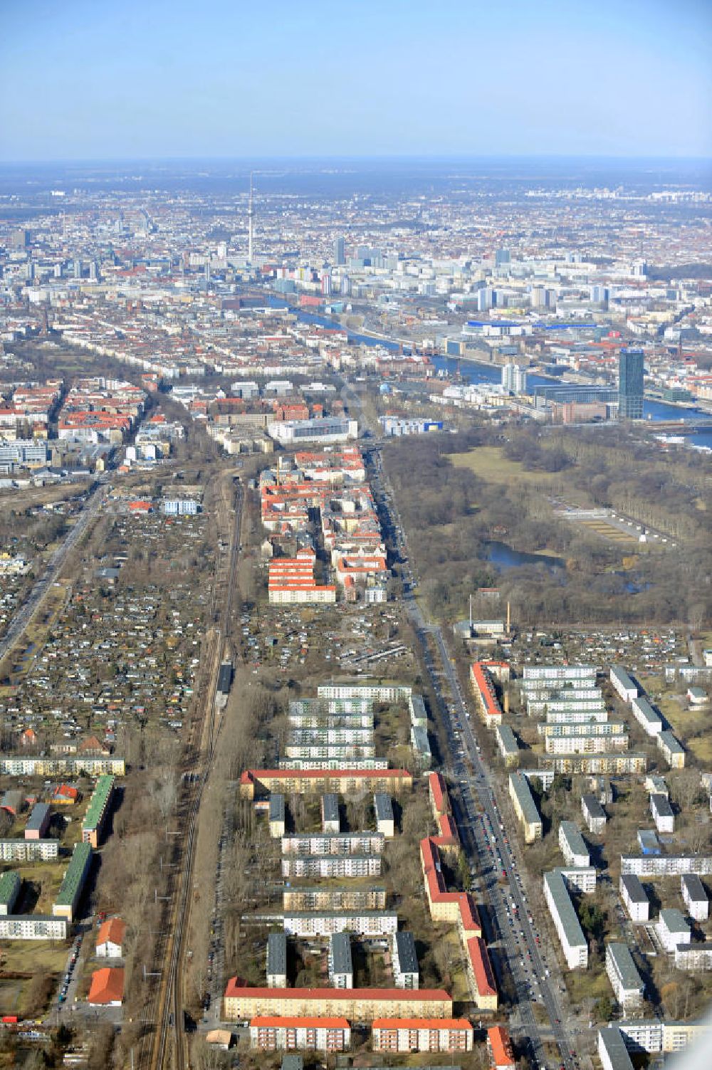 Berlin from above - View at the Treptow district of Berlin at the Köpenicker country road. The course of the Spree river at the office building complex Treptower and the Soviet War Memoria can be seen