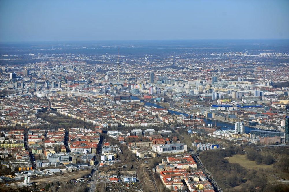 Berlin from above - View at the Treptow district of Berlin at the Köpenicker country road. The course of the Spree river and the Soviet War Memoria can be seen