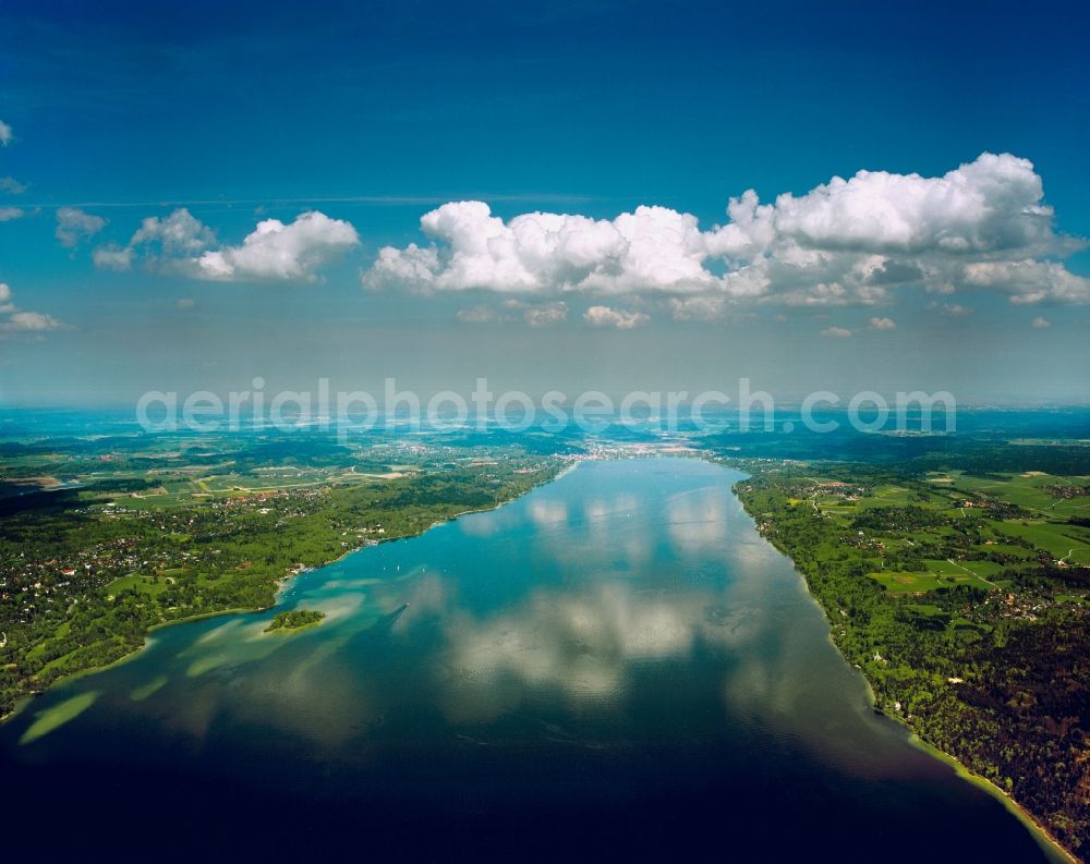 Feldafing from the bird's eye view: Lake Starnberg near the county of Feldafing in the district of Starnberg in the state of Bavaria. The lake is the fifth largest lake in Germany and takes the number two spot in water volume. It is property of the free state of Bavaria. For thousands of years it was significant for fishing. Today it is an important recreational area and tourist site