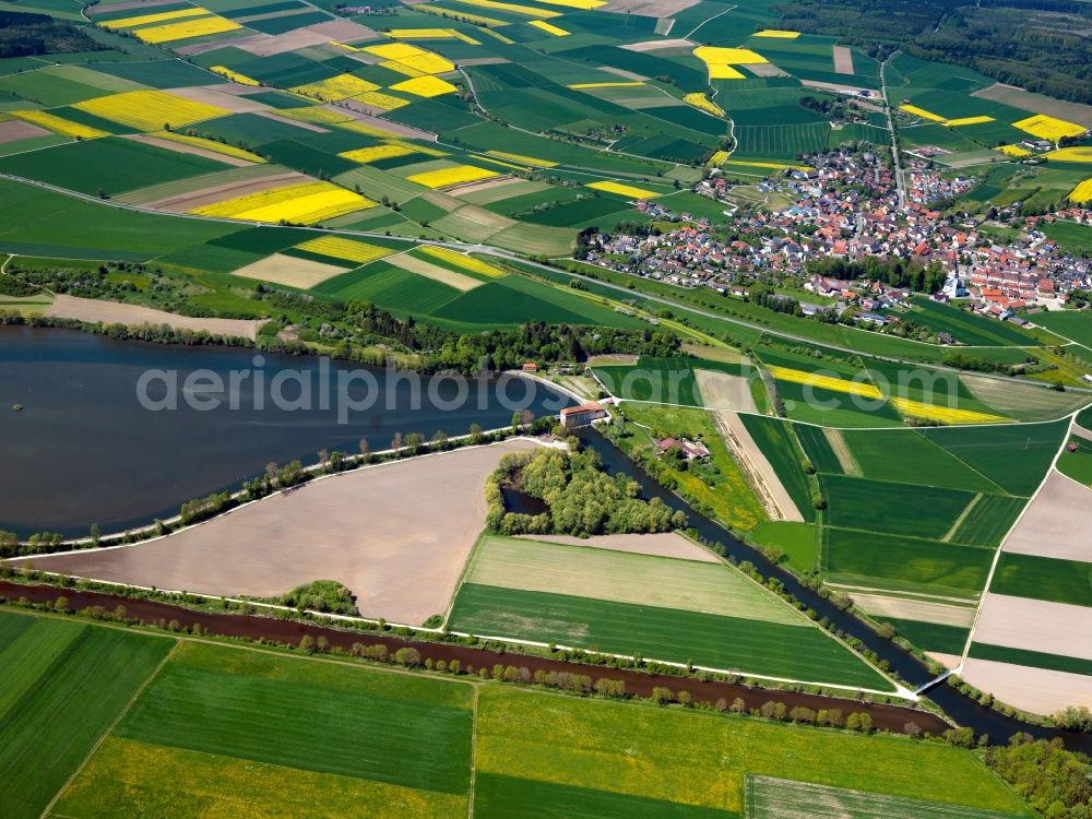 Öpfingen from the bird's eye view: The barrier lake and the power plant in Öpfingen in the state of Baden-Württemberg. The barrier lake is located on the Danube. The facilities consist of a channel, a lake and the plant which have been in place since the 1920s. It facilitates energy supply for the municipial utilities of Ulm and Neu-Ulm