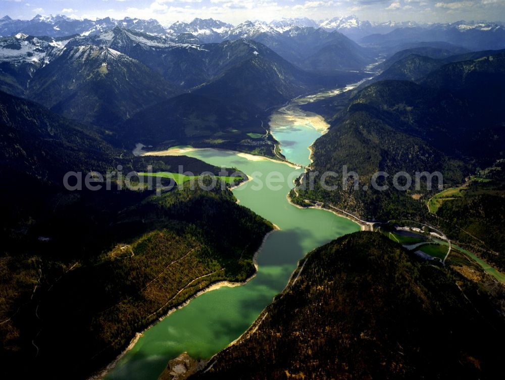 Aerial image Lenggries - The barrier lake Sylvensteinspeicher in the Isar Valley region in the state of Bavaria. The lake was originally built for flood protection in the valley. Two power plants are used for energy & power generation. The lake is located in the Upper Isar Valley