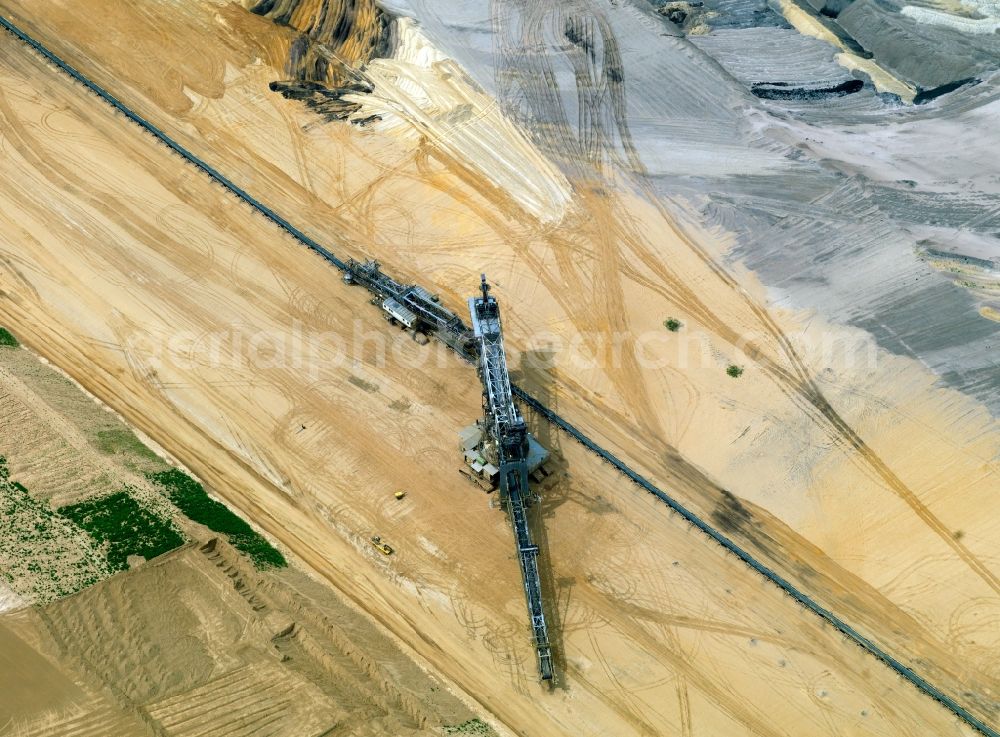 Aerial image Amsdorf - The opencast pit in the central German brown coal field in the state of Saxony-Anhalt. The compound belongs to ROMONTA GmbH. The facility is especially rich with Bitumen. The soft coal is extracted with bucket and bucket wheel excavators