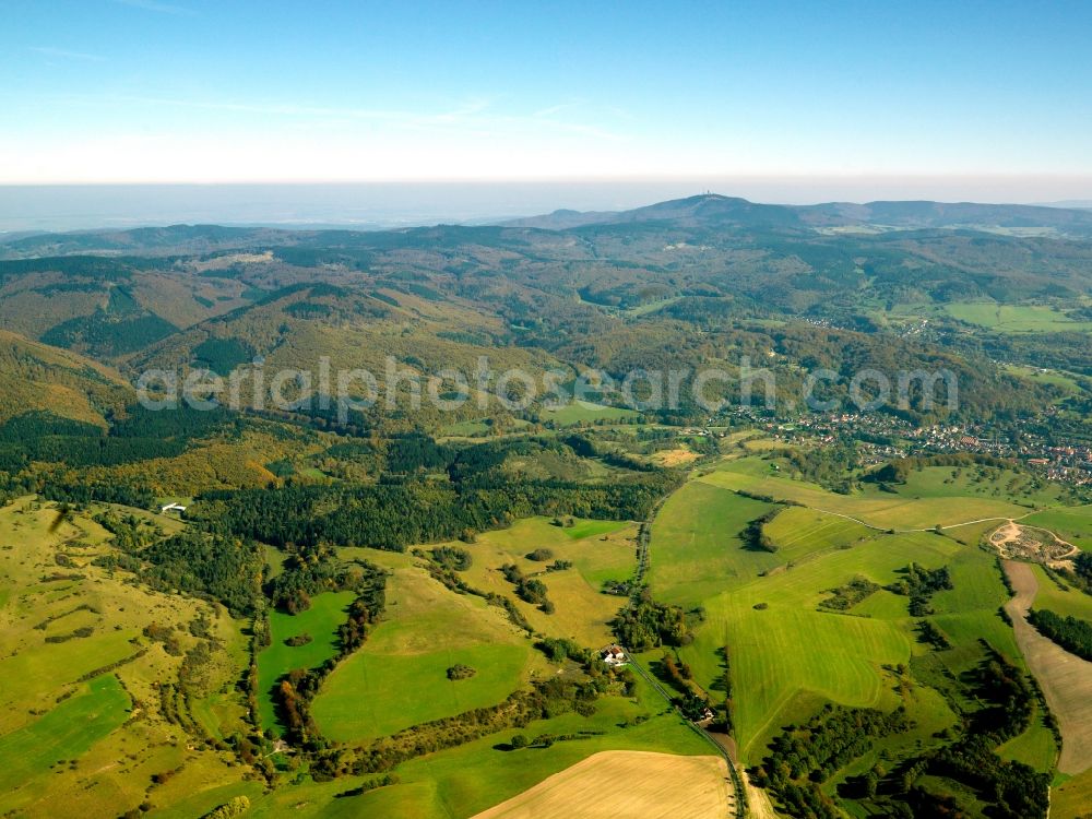 Aerial image Bad Liebenstein - The Thuringian Forest in Bad Liebenstein in the state of Thuringia. Bad Liebenstein is the name giving part of the city of Bad Liebenstein in the Wartburg-Stiftung Eisenachkreis region. The city is important as a health resort and spa as well as a tourist destination. Visible in the overview are the hills and landscape of the region as well as its mixed tree forest