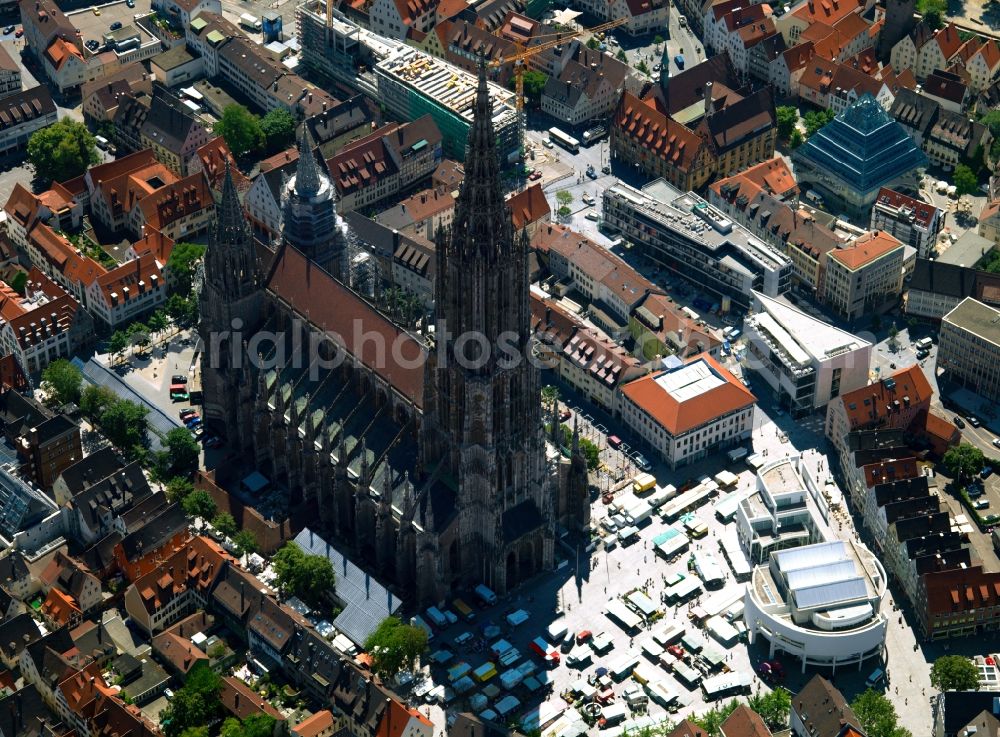 Ulm from above - The Minster is a Gothic style church built in Ulm, a former free imperial city. Completed in 1890, 161.53 m high tower is the tallest church tower in the world. The foundation stone was laid in 1377, when the free imperial city of Ulm were Roman Catholics through the centuries