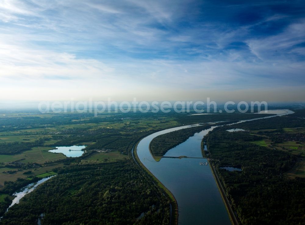 Aerial photograph Ortenaukreis - The run of the Rhine in the county district of Ortenaukreis in the state of Baden-Württemberg. The river runs very broadly and is characterised by side arms and islands. It forms the border between Germany and France in this area and is used for shipping and transportation