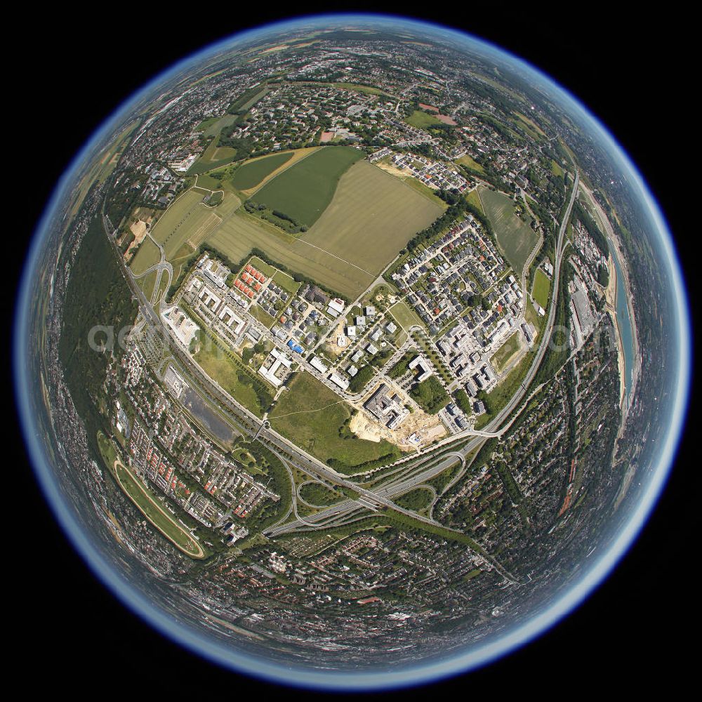 Dortmund from the bird's eye view: Fish-eye of the Westphalendamm in Dortmund with the adjacent industrial zone An Der Freien Vogel Street, which is the regional headquarters of ADAC, home to Holiday Inn Express Hotel and the City of Stadtkrone Development Company