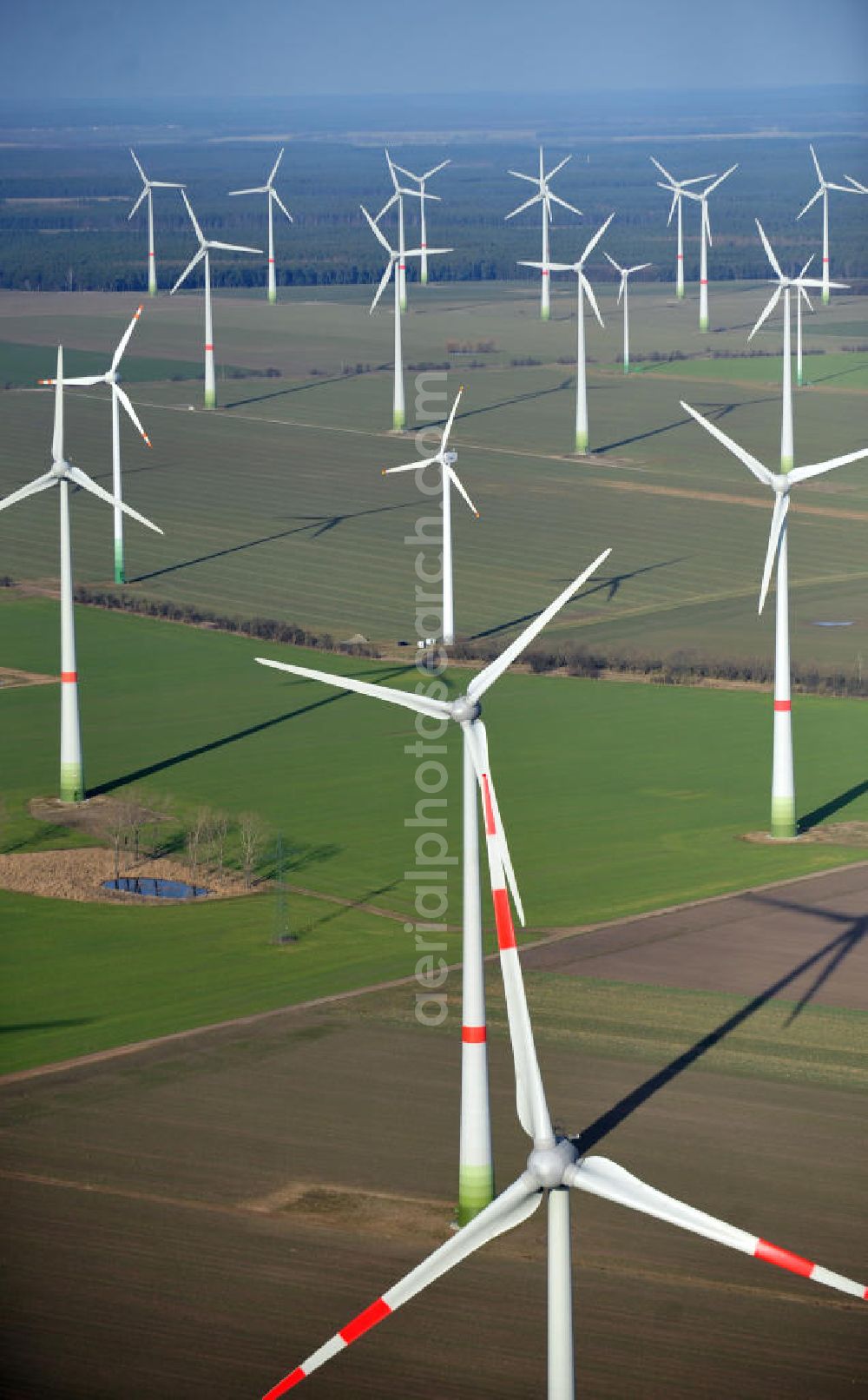 Aerial photograph Treuenbrietzen - View of the wind farm Marzahna of Treuenbrietzen. The Winpark opened in 2006 and extended in 2007. Operater of the power generation system is the Enertrag AG