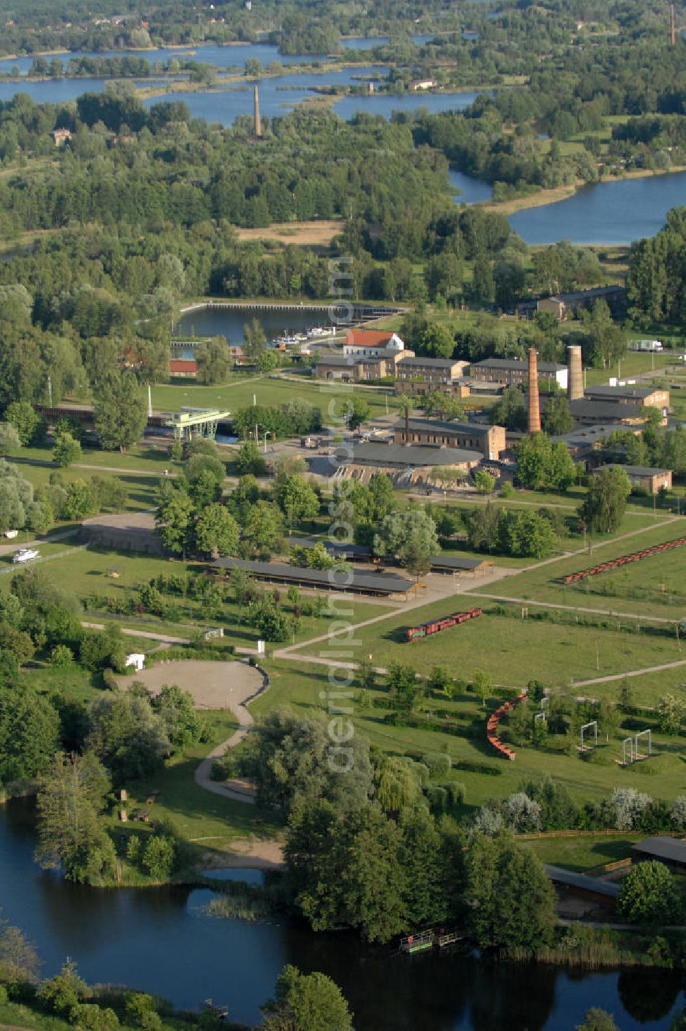 Zehdenick from the bird's eye view: Blick auf den Ziegeleipark Mildenberg. Ursprünglich war das Zedenicker Ziegeleirevier das größte in Europa eine der bedeutesten Industrie-Kultur-Stätten. Aus den Ziegeln, die hier gebrannt wurden, wurden große Teile Berlins und der Mark gebaut. Seit 1997 ist das 42 ha große Areal ein Museumspark. Kontakt: Ziegeleipark, Ziegelei 10, 16792 Zehdenick (Ortsteil Mildenberg), Tel. 03307 / 3 10 4 10, info@ziegeleipark.de