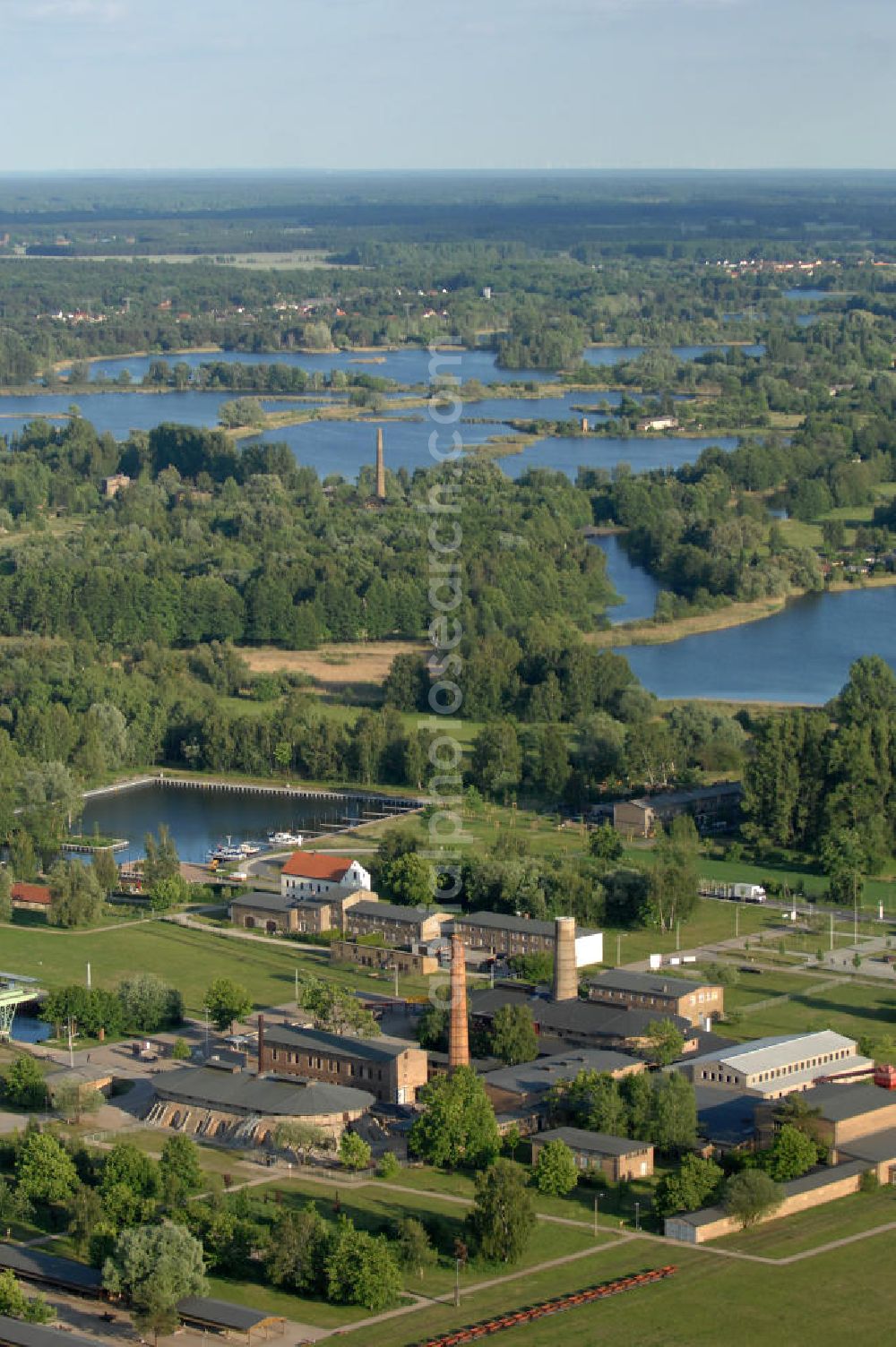 Aerial photograph Zehdenick - Blick auf den Ziegeleipark Mildenberg. Ursprünglich war das Zedenicker Ziegeleirevier das größte in Europa eine der bedeutesten Industrie-Kultur-Stätten. Aus den Ziegeln, die hier gebrannt wurden, wurden große Teile Berlins und der Mark gebaut. Seit 1997 ist das 42 ha große Areal ein Museumspark. Kontakt: Ziegeleipark, Ziegelei 10, 16792 Zehdenick (Ortsteil Mildenberg), Tel. 03307 / 3 10 4 10, info@ziegeleipark.de