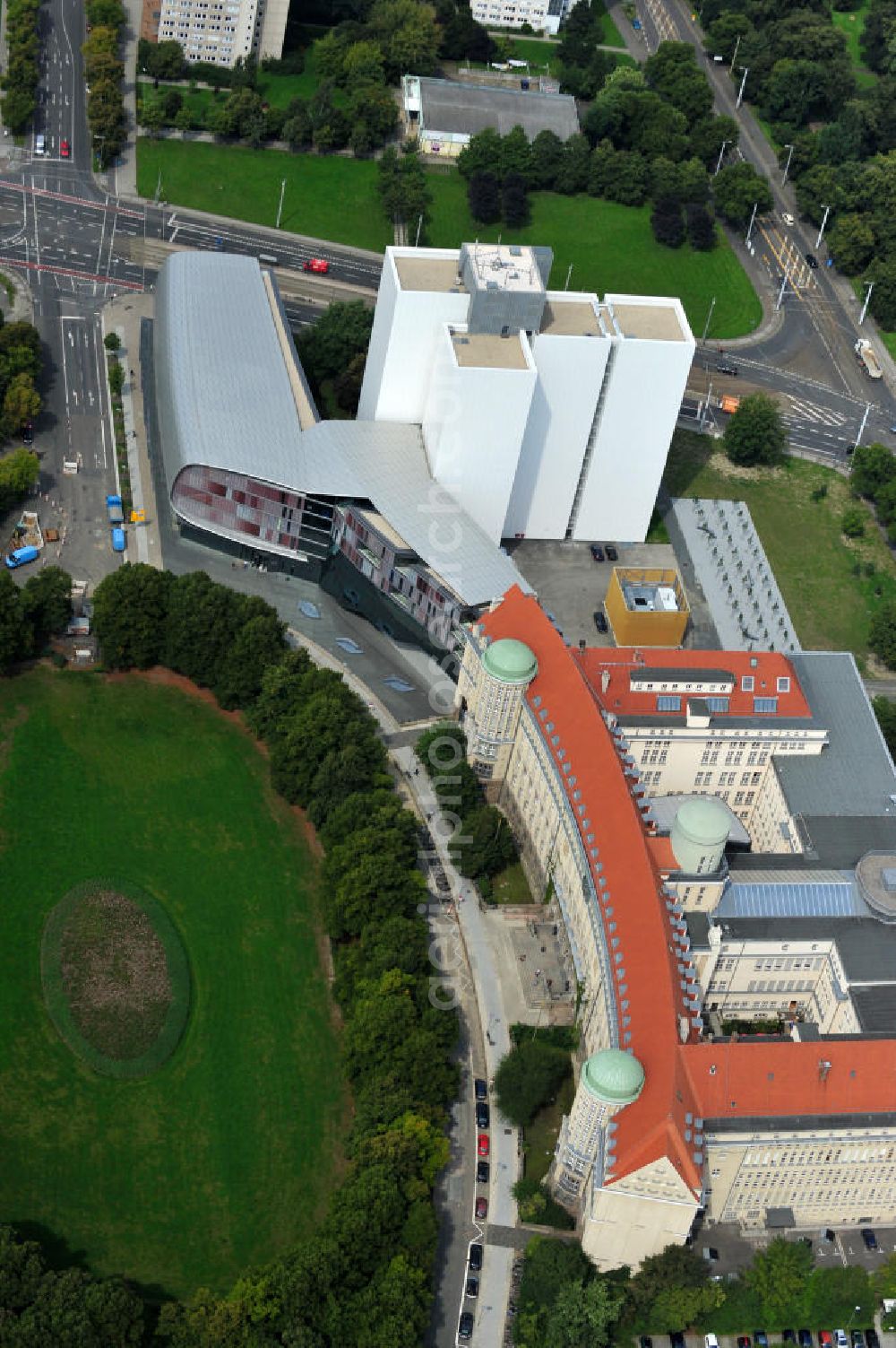 Aerial image Leipzig - Blick auf den Standort der Deutschen Nationalbibliothek in Leipzig, mit dem Bücherturm und dem vierten Erweiterungsbau. Die Bibliothek in Leipzig wurde 1912 als Deutsche Bücherei gegründet und mit der Wiedervereinigung Deutschlands 1989 mit der Deutschen Bibliothek in Frankfurt am Main zusammengeschlossen Im Jahr 2006 erfolgte die Umbenennung in die Deutsche Nationalbibliothek, die heute Standorte in Leipzig, Frankfurt am Main und Berlin hat und unter an derem das Deutsche Musikarchiv beherbergt. Der Erweiterungsbau in Leipzig wurde 2010 eröffnet. View to an location of the German National Library in Leipzig.