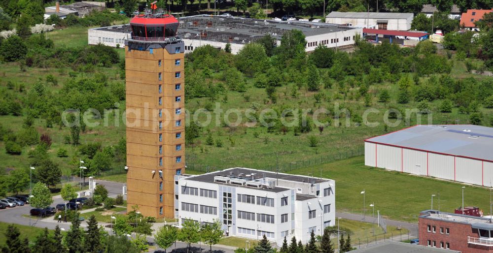 Schönefeld from the bird's eye view: Der alte Tower / Kontrollturm der Deutschen Flugsicherung DFS auf dem Flughafen Berlin-Schönefeld. The old control tower of the German Air Navigation Services / air traffic control at Schoenfeld Airport.