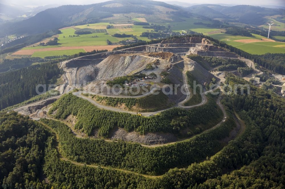 Aerial image Bestwig - Area of the quarry Diabaswerk Halbeswig near Bestwig in the state North Rhine-Westphalia. Operator of the quarry is Diabaswerk Halbeswig GmbH & Co. KG. Diabase is exploit there