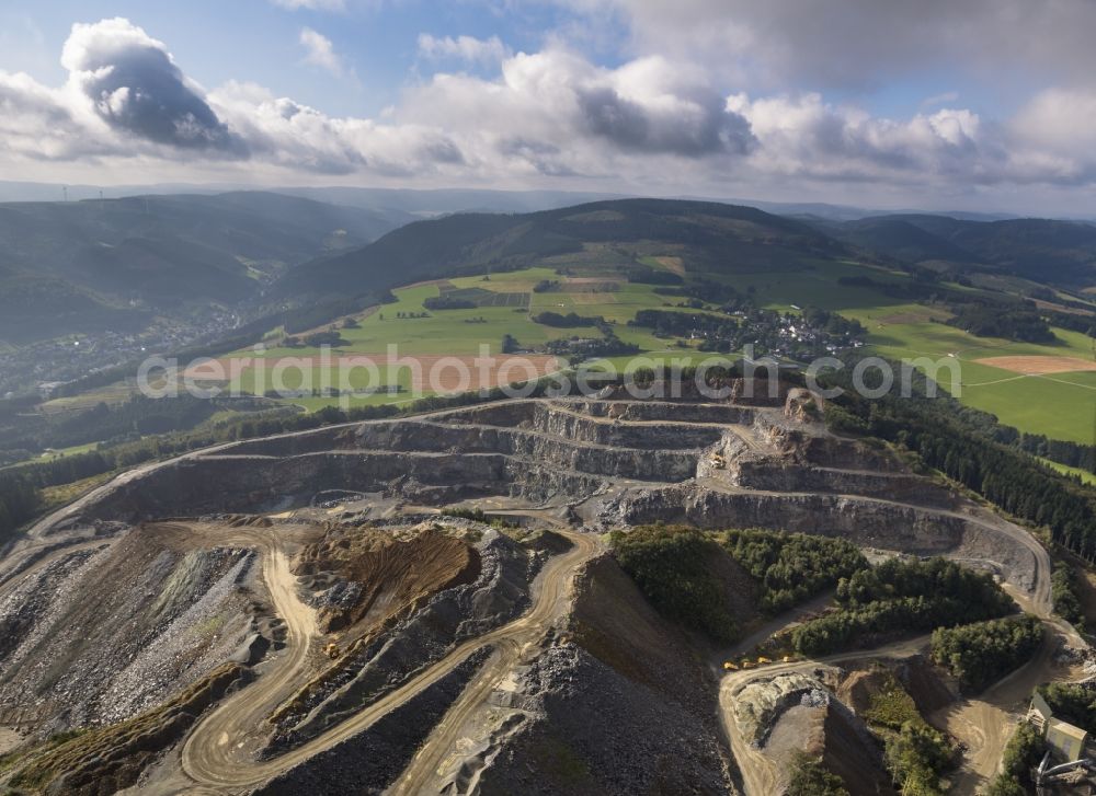 Aerial photograph Bestwig - Area of the quarry Diabaswerk Halbeswig near Bestwig in the state North Rhine-Westphalia. Operator of the quarry is Diabaswerk Halbeswig GmbH & Co. KG. Diabase is exploit there