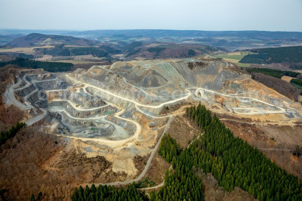 Aerial image Bestwig - Area of the quarry Diabaswerk Halbeswig near Bestwig in the state North Rhine-Westphalia. Operator of the quarry is Diabaswerk Halbeswig GmbH & Co. KG. Diabase is exploit there