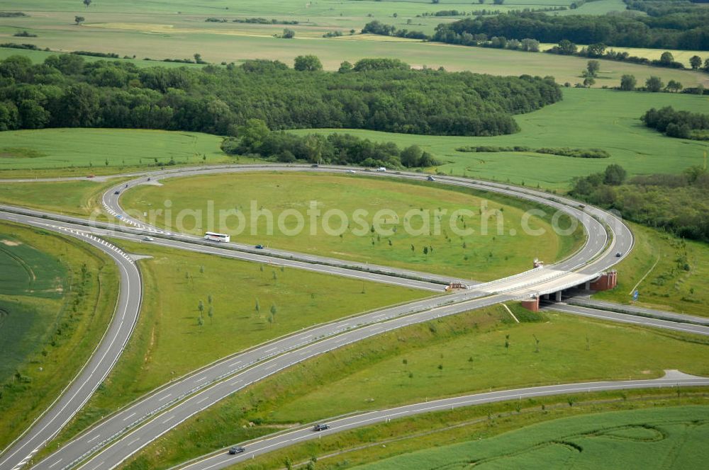 Aerial image Stralsund - Blick auf die Autobahn Anschlussstelle Stralsund 24. Sie verbindet die A 20 mit der B 96, als Zubringer zur Insel Rügen. Eröffnet wurde sie im November 2004. Kontakt: DEGES Deutsche Einheit Fernstraßenplanungs- und -bau GmbH Öffentlichkeitsarbeit, Tel. 030-202 43 352, info@deges.de