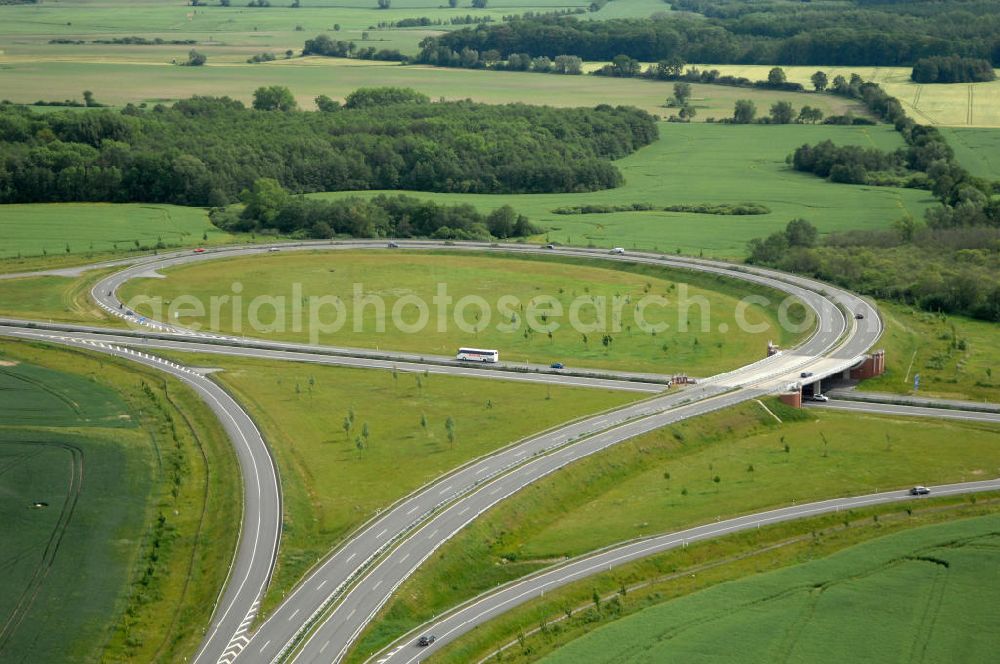 Aerial photograph Stralsund - Blick auf die Autobahn Anschlussstelle Stralsund 24. Sie verbindet die A 20 mit der B 96, als Zubringer zur Insel Rügen. Eröffnet wurde sie im November 2004. Kontakt: DEGES Deutsche Einheit Fernstraßenplanungs- und -bau GmbH Öffentlichkeitsarbeit, Tel. 030-202 43 352, info@deges.de