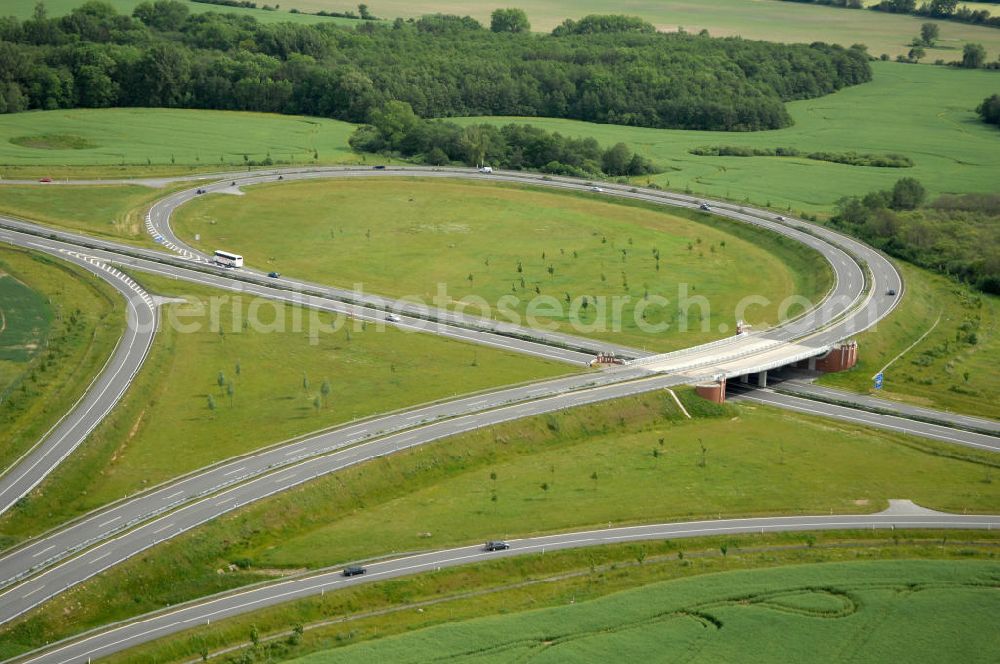 Stralsund from the bird's eye view: Blick auf die Autobahn Anschlussstelle Stralsund 24. Sie verbindet die A 20 mit der B 96, als Zubringer zur Insel Rügen. Eröffnet wurde sie im November 2004. Kontakt: DEGES Deutsche Einheit Fernstraßenplanungs- und -bau GmbH Öffentlichkeitsarbeit, Tel. 030-202 43 352, info@deges.de