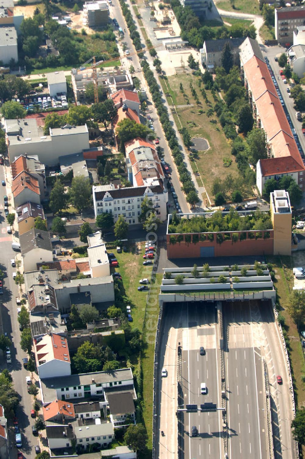 Aerial image Berlin - Blick auf ie Autobahnauffahrt 24 Buschkrugallee der A100, die Berliner Stadtautobahn.