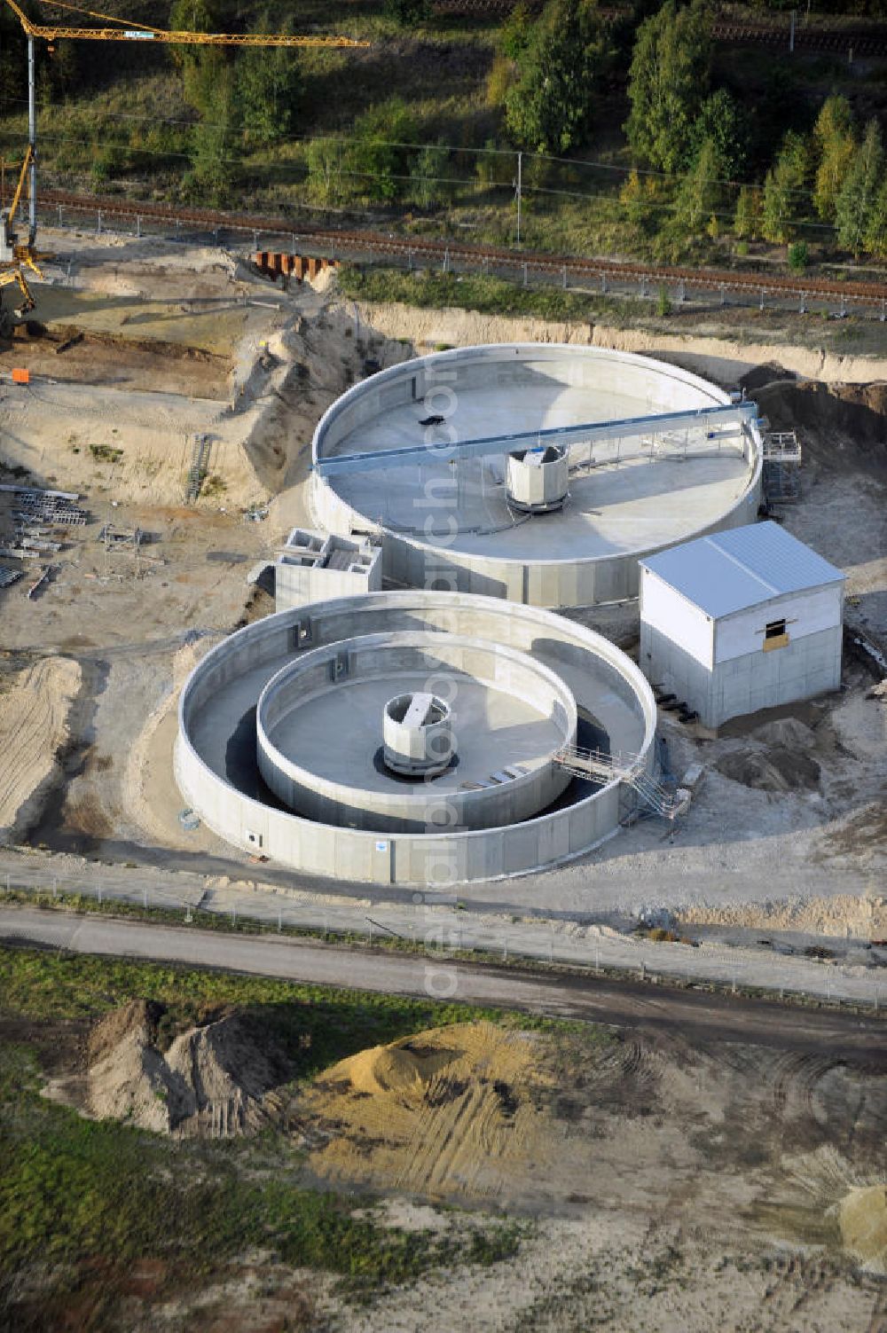 Spremberg from above - View of the site of the new sewage treatment plant in the Schwarze Pumpe district of the city of Spremberg. The company Baucom and the plant engineers Bamag were entrusted with the planning and construction of the sewage treatment plant. It is built on the site of the former power plant in Schwarze Pumpe industrial park east