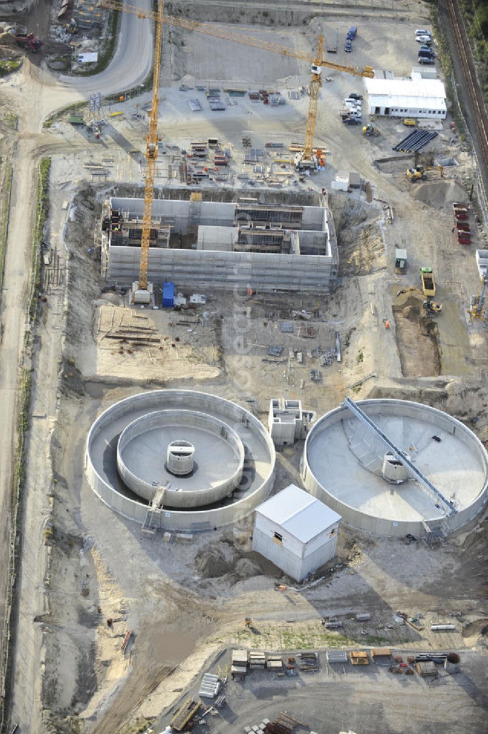 Aerial photograph Spremberg - View of the site of the new sewage treatment plant in the Schwarze Pumpe district of the city of Spremberg. The company Baucom and the plant engineers Bamag were entrusted with the planning and construction of the sewage treatment plant. It is built on the site of the former power plant in Schwarze Pumpe industrial park east