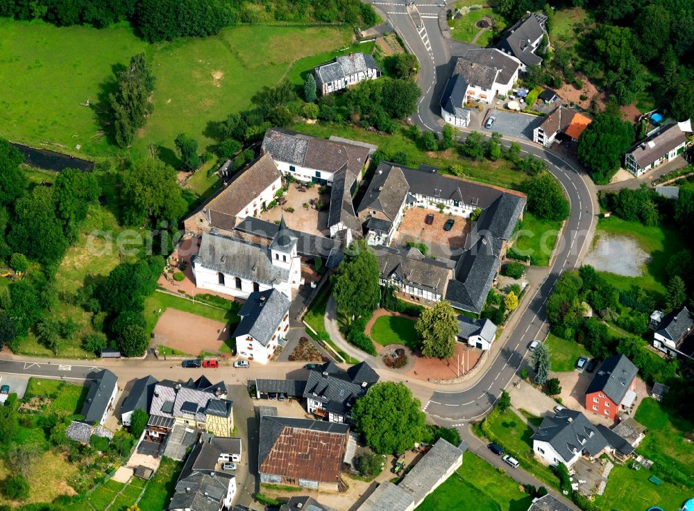 Aerial photograph Heimbach - The Burghausen is on the eastern edge of Hausen, a suburb of Heimbach above the Rur in Düren. The castle was built before 1348, but certified the first time this year