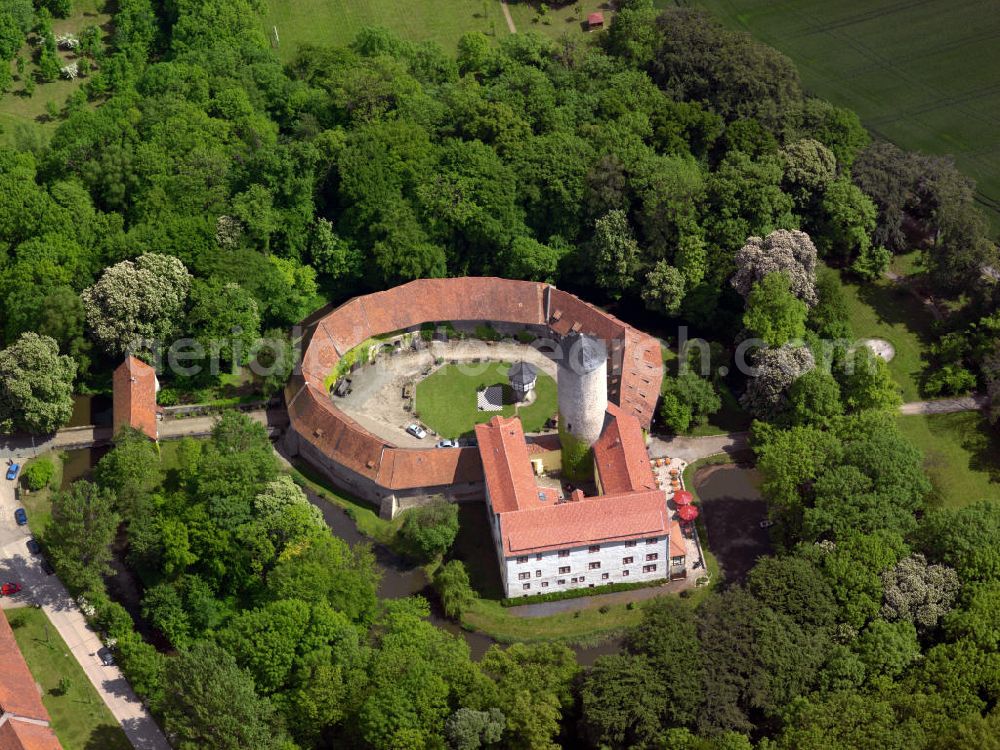 Huy from the bird's eye view: Photo of the castle Westerburg of the Huy community in Saxony-Anhalt. It the oldest moated castle in Germany. It houses a hotel and the register office of the town of dingelstädt