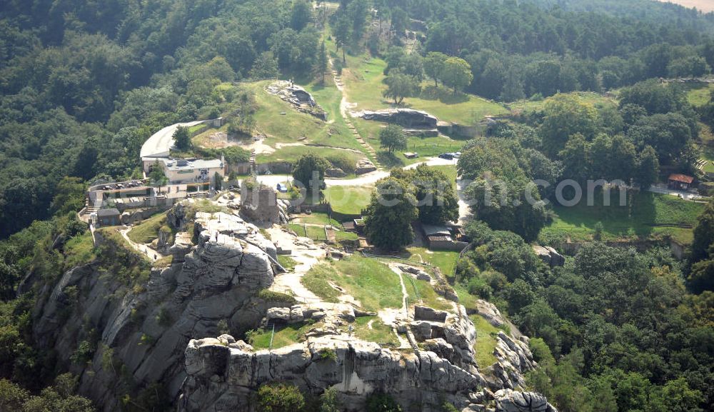 Blankenburg from the bird's eye view: Die Burgruine Regenstein liegt 3 km nördlich von Blankenburg in Sachsen-Anhalt und ist ein beliebtes Ausflugsziel, auf dem jedes Jahr ein Ritterspiel und ein Garnisonsfest stattfinden. Hervorzuheben sind einige in den Fels hineingehauene Räume und die Ruine des Bergfrieds.