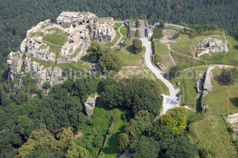 Blankenburg from the bird's eye view: Die Burgruine Regenstein liegt 3 km nördlich von Blankenburg in Sachsen-Anhalt und ist ein beliebtes Ausflugsziel, auf dem jedes Jahr ein Ritterspiel und ein Garnisonsfest stattfinden. Hervorzuheben sind einige in den Fels hineingehauene Räume und die Ruine des Bergfrieds.