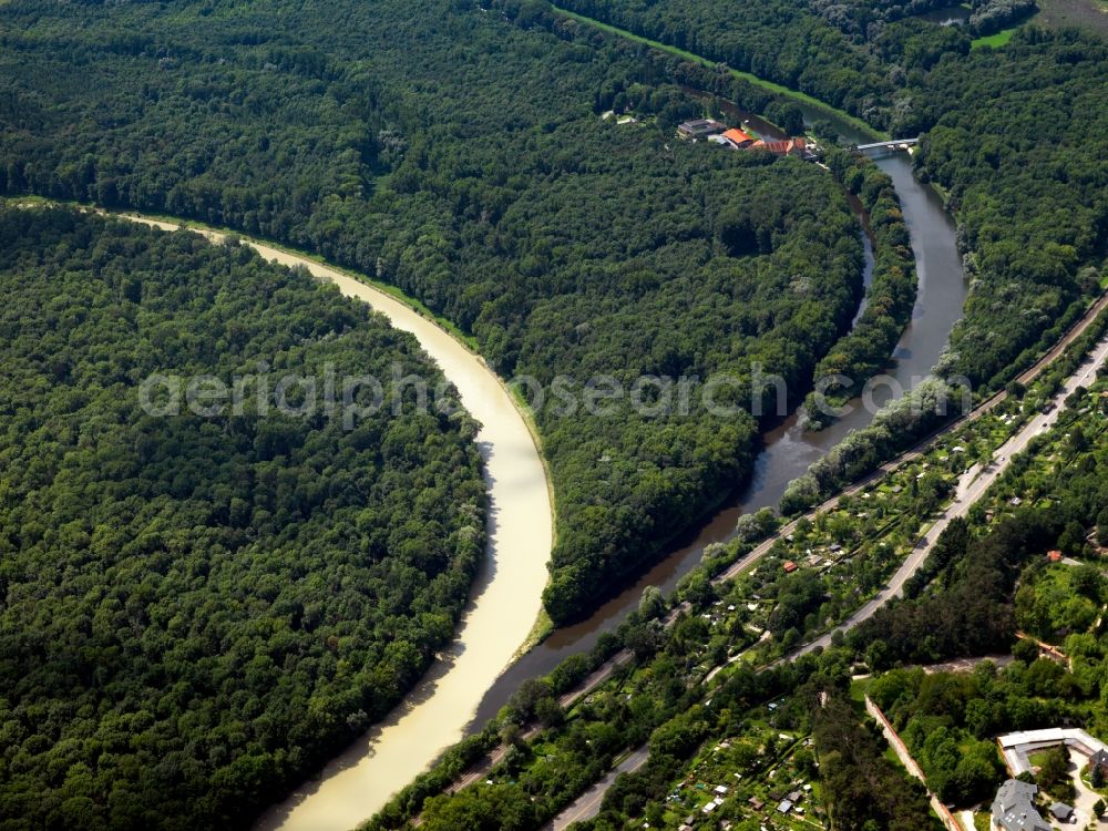 Ulm from the bird's eye view: The Danube and the power station channel Ulm-Wiblingen in the Southwest of Ulm in the state of Baden-Württemberg. The channel leads to the hydro power station Wiblingen - located in the forest - and then meets the Danube. Adjacent to it, there is a railway track and the federal highway 311