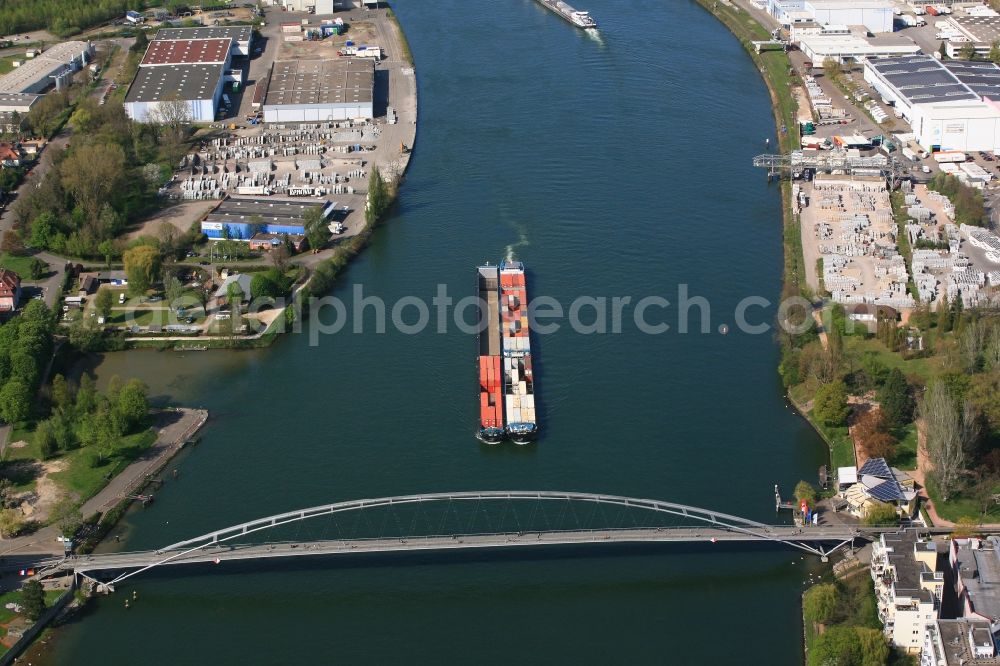 Weil am Rhein from the bird's eye view: River - bridge construction Dreilaenderbruecke is crossing the river Rhine in Weil am Rhein in the state Baden-Wuerttemberg, Germany