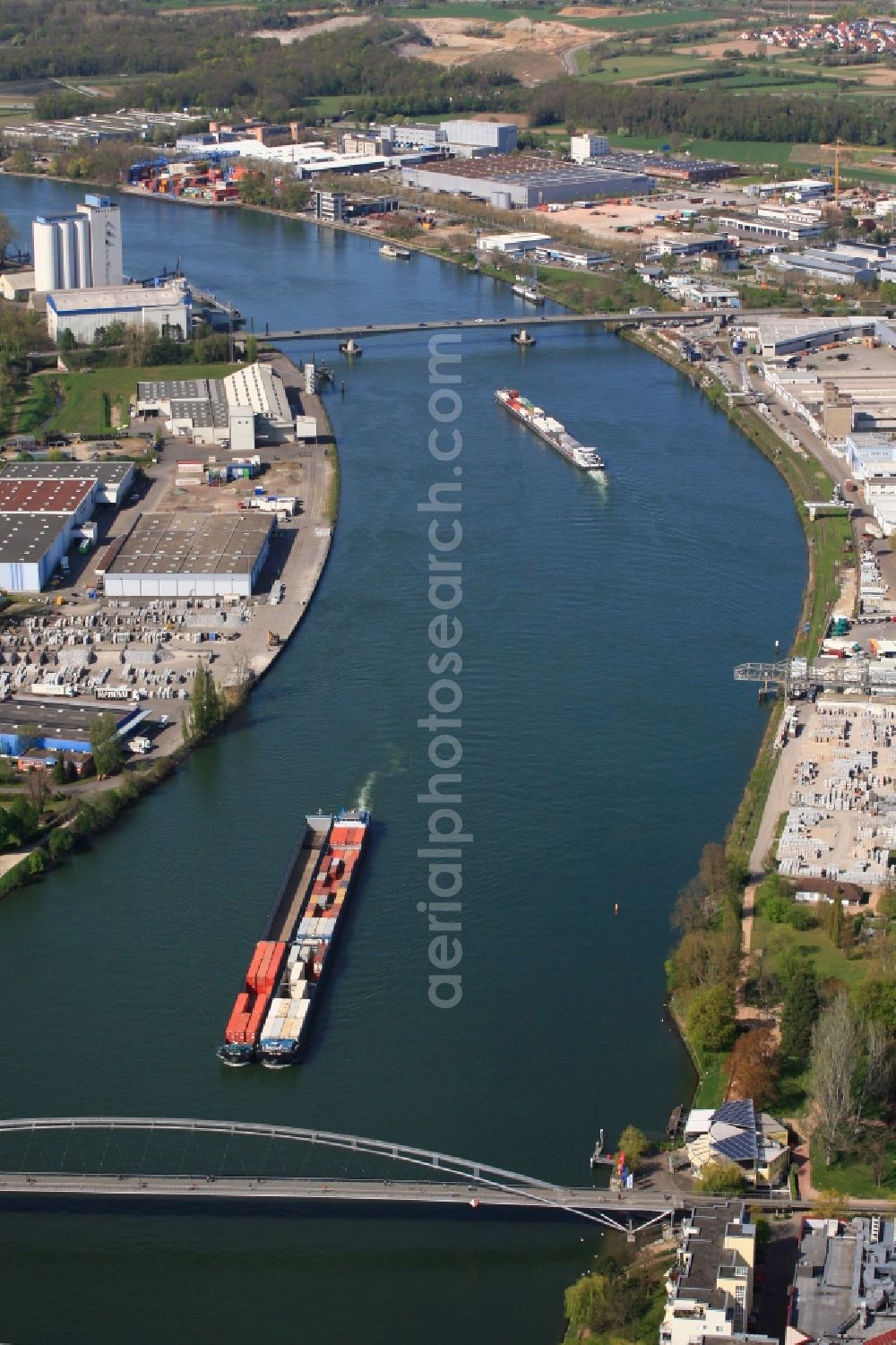 Aerial image Weil am Rhein - River - bridge construction Dreilaenderbruecke is crossing the river Rhine in Weil am Rhein in the state Baden-Wuerttemberg, Germany